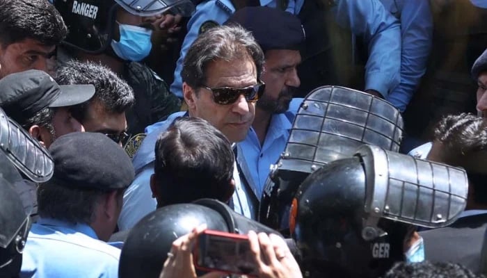 PTI founder Imran Khan arrives to appear at the Islamabad High Court on May 12, 2023. —APP