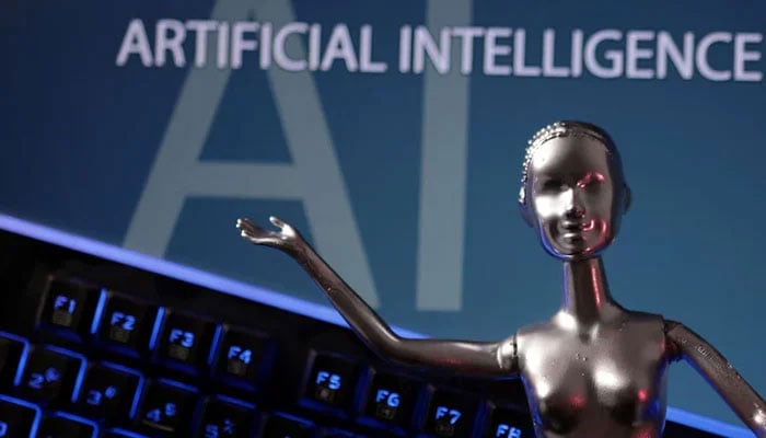 A metallic figure is pictured along with artificial intelligence (AI) in this illustration taken, May 4, 2023. — Reuters