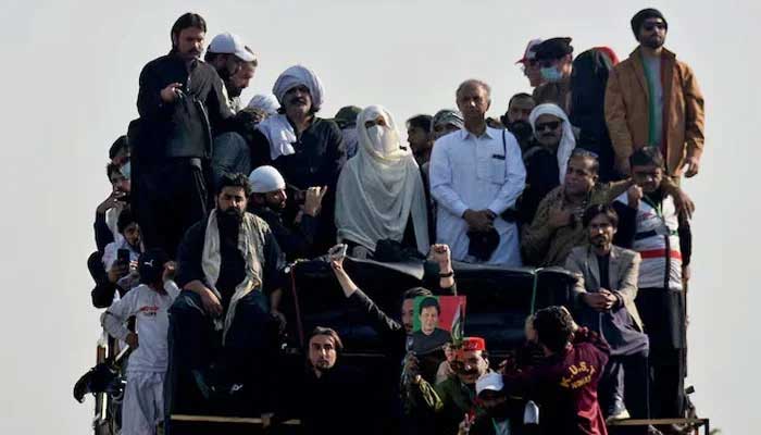 Bushra Bibi, wife of jailed former prime minister Imran Khan, and leaders of Khans party Pakistan Tehreek-e-Insaf (PTI) attend a rally demanding his release, in Islamabad, November 26, 2024. — Reuters