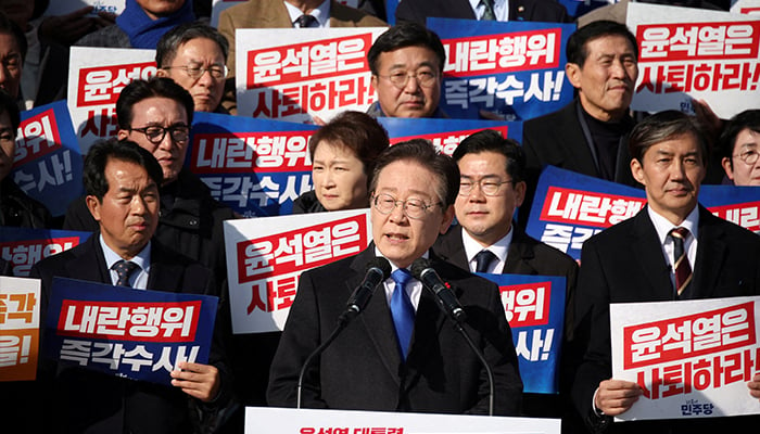 South Koreas main opposition Democratic Party leader Lee Jae-myung, lawmakers and people attend a rally to condemn presidents surprise declaration of the martial law and to call for his resignation, at the national assembly in Seoul, South Korea December 4, 2024. — Reuters