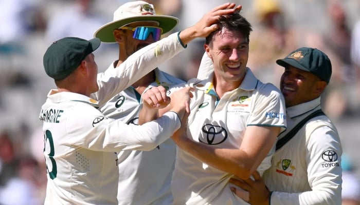 Australian team celebrates a wicket during a Test match against Pakistan in Melbourne, Australia, on December 27, 2023. —Cricket Australia