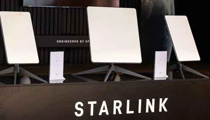 A representational image showing Starlink logo at the companys stall during an exhibition. — AFP/File