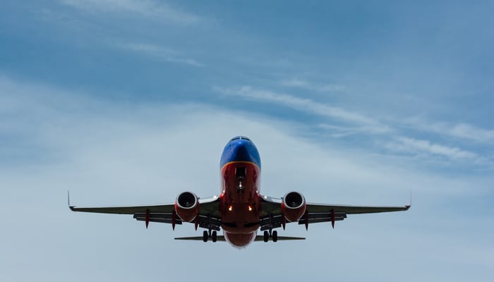 A representational image of a plane mid-flight. — Unsplash/file