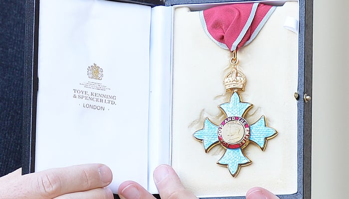 A medal denoting a Commander of the Order of the British Empire (CBE). — AFP