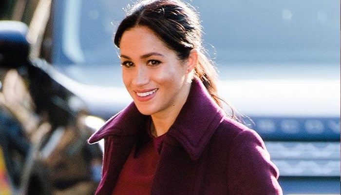 Meghan Markle looking ‘genuinely happy without Prince Harry at her side