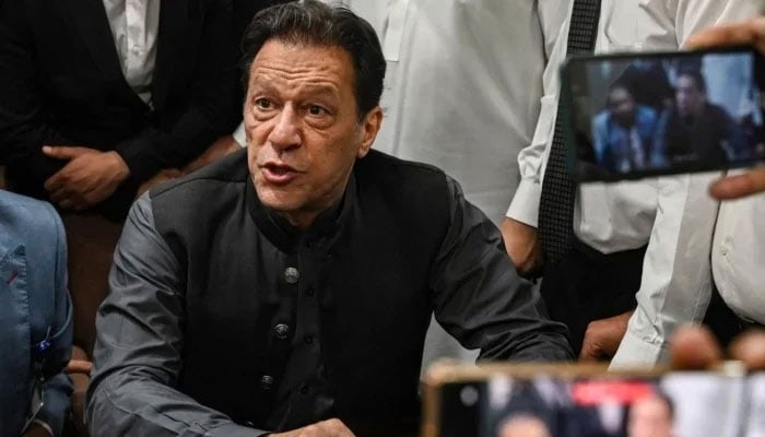 PTI founder Imran Khan speaks to media during a court hearing in Islamabad. — AFP/File