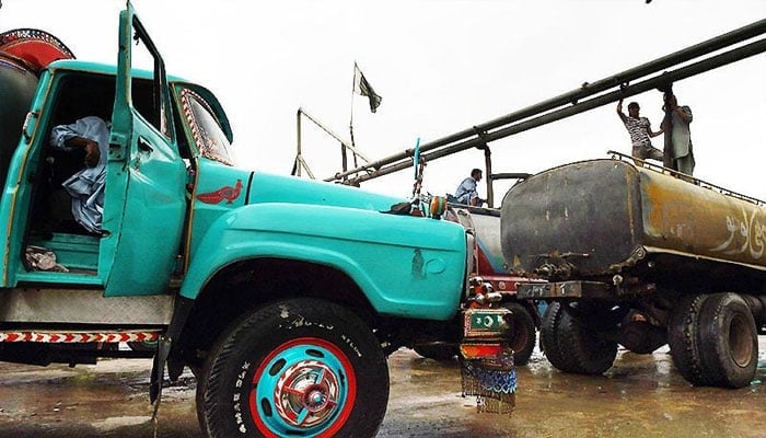 A representational image of water tanks on a road. — AFP/file