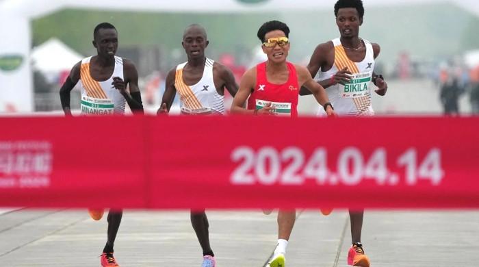 China half marathon offers cow, wild fish and chickens as prizes