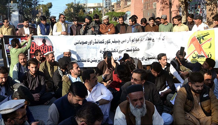 Residents of Bagan Kurram are holding protest demonstration against unrest law and order situation in their area and demanding for peace, held at Peshawar press club on Wednesday, December 4, 2024. — PPI