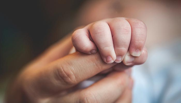 This is a representational image of a babys hands. — Facebook/Passiontvng