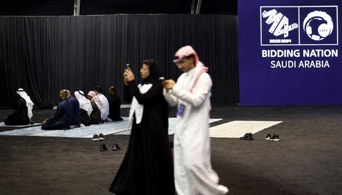 General view as people pray inside Saudi Arabia World Cup bid exhibition after FIFA confirms Saudi Arabia as the 2034 World Cup hosts  on December 11, 2024. — Reuters