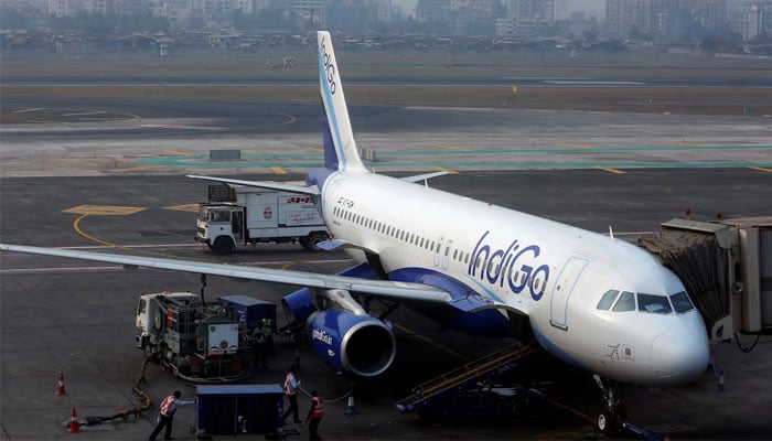 An IndiGo Airlines Airbus A320 aircraft is pictured parked at a gate at Mumbai airport in this undated image. — Reuters