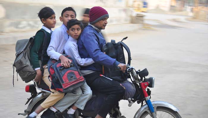 Students can be seen leaving for school after winter vacation in Karachi on January 1, 2024. — Online