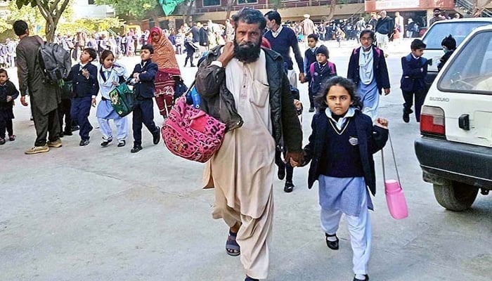 In this undated photo, Children are on the way to their school. — APP/File