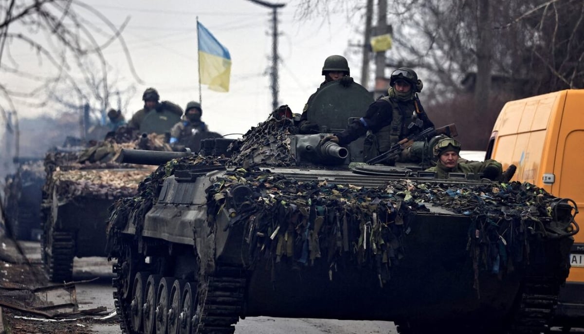 Ukrainian soldiers are pictured in their tanks, amid Russias invasion on Ukraine, in Bucha, in Kyiv region, Ukraine April 2, 2022. — Reuters