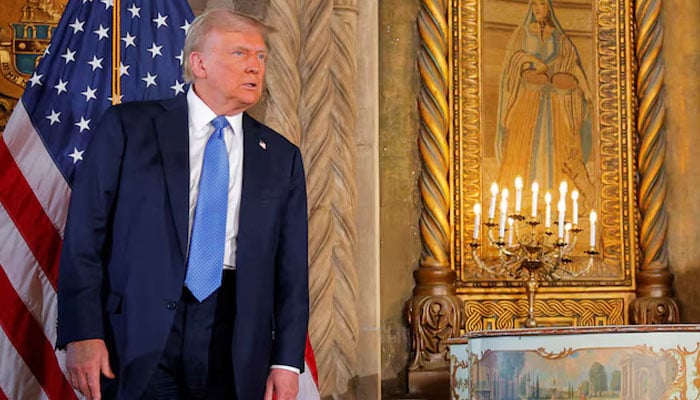 US President-elect Donald Trump listens to a question from a reporter after delivering remarks at Mar-a-Lago in Palm Beach, Florida, US, December 16, 2024. — Reuters