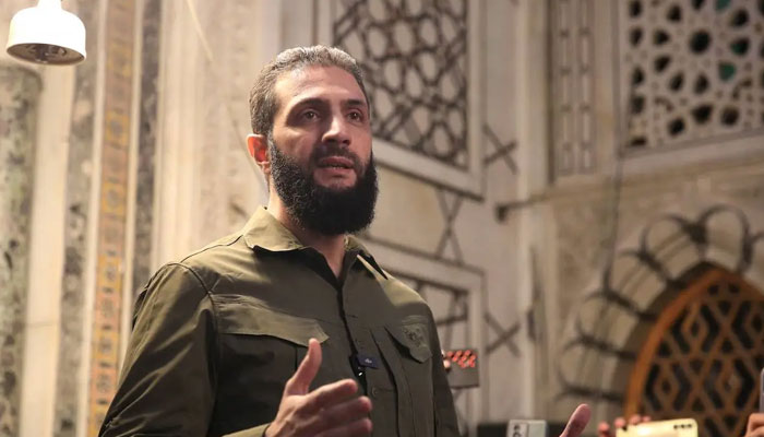 The leader of Syria’s Hayat Tahrir al-Sham (HTS) group that headed a lightning rebel offensive snatching Damascus from government control, Abu Mohammed al-Jolani, addresses a crowd at the capital’s landmark Umayyad Mosque on December 8, 2024. — AFP