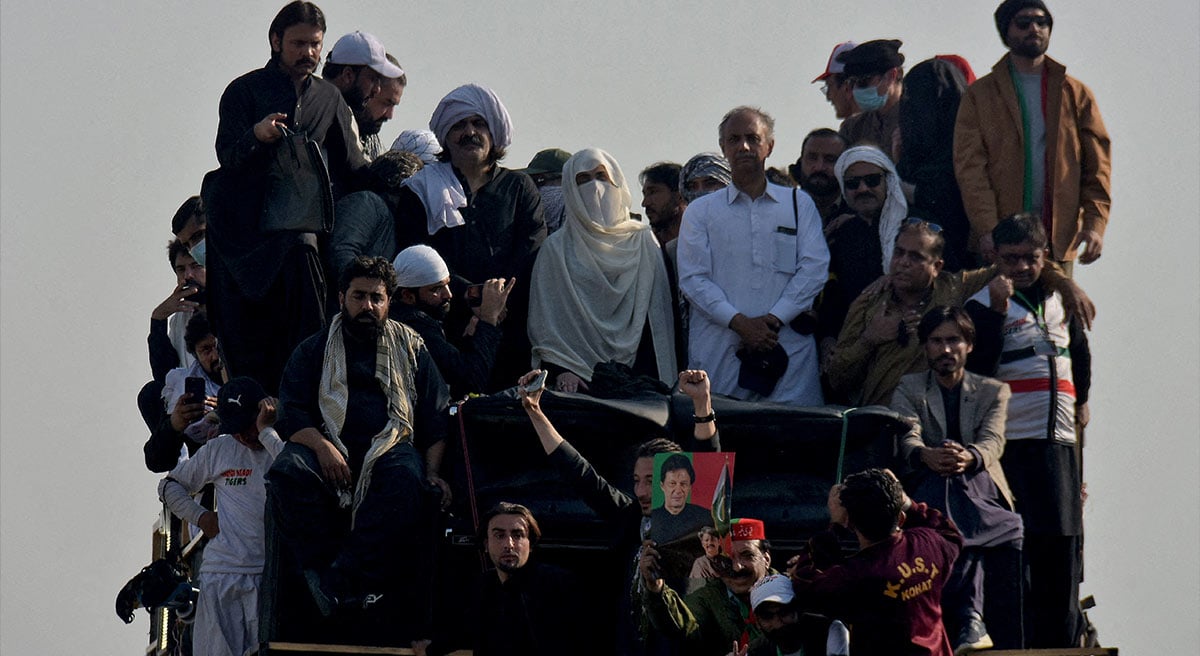 Bushra Bibi, wife of jailed former prime minister Imran Khan, and supporters of Khans party Pakistan Tehreek-e-Insaf (PTI) attend a rally demanding his release, in Islamabad, November 26, 2024. — Reuters