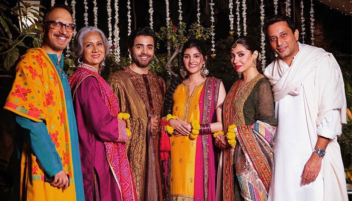 Sheheryar Munawar Siddiqui and Maheen Siddiqui pose for photographs at their first wedding function. — Instagram@sheheryarmunawar