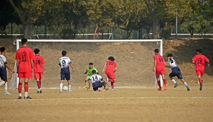 Football players in action during Quaid-e-Azam Inter-Provincial Games at Pakistan Sports Complex Islamabad. — Facebook/@PakistanSportsBoard