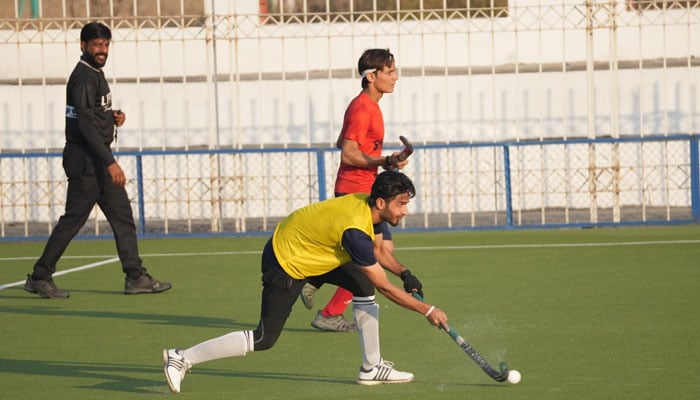 In this representational image, a hockey match is being played between two team. — Facebook/ Pakistan Sports Board