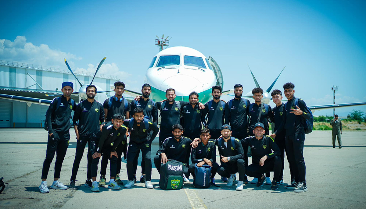 Pakistan mens football team pose for a photo after reaching Tajikistan for second-round matches of the 2026 FIFA World Cup qualifier. — Facebook/@PakistanFootballOfficial/File