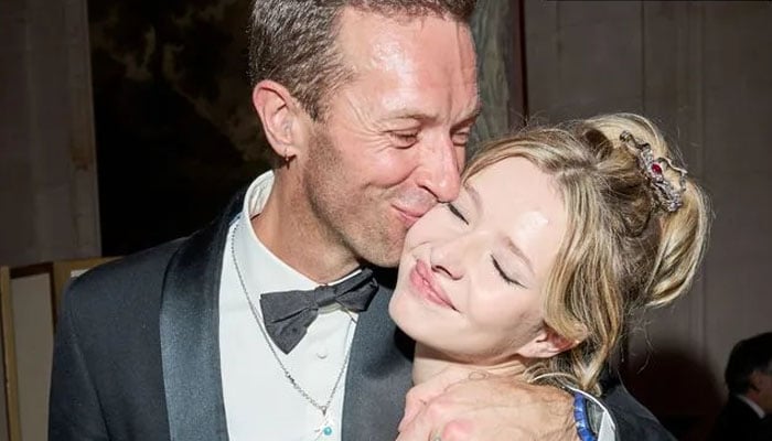 Chris Martin danced joyfully with his and Gwyneth Paltrows daughter Apple at the ball