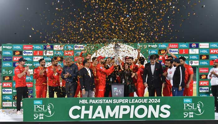 Shadab Khan collects PSL trophy as Islamabad United beat Multan Sultans in the final of ninth edition of Pakistan Super League, Karachi, March 18, 2024. — PCB