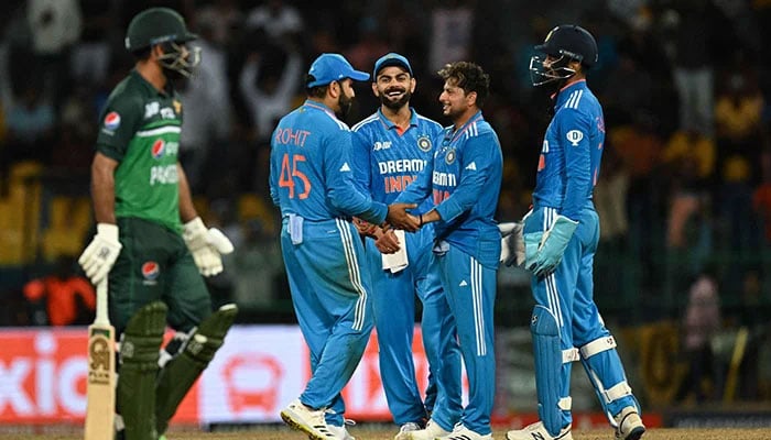 Indian players celebrate after taking the wicket of a Pakistani batter during the Asia Cup 2023 super four ODI match at the R. Premadasa Stadium in Colombo on September 11, 2023. — AFP