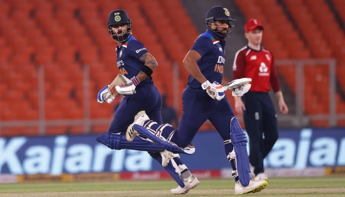 Indias Virat Kohli (left) in action with Rohit Sharma at Narendra Modi Stadium, Ahmedabad, in India on March 20, 2021. —Reuters