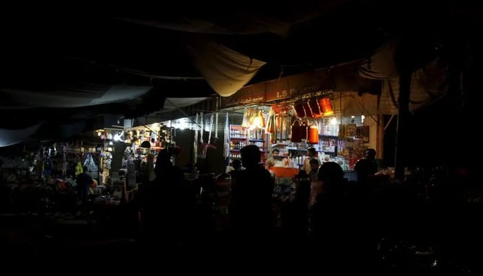 A view of a market during power a breakdown in Karachi. — Reuters/File