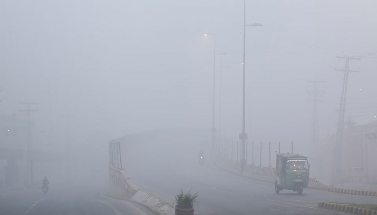 A view of vehicles amid smog along a highway in Multan, November 8, 2024. — Reuters