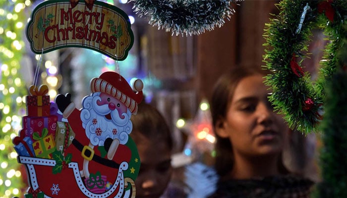 Christmas decorative items are being sold in connection with the Christmas celebrations in the city at Saddar Bohri Bazar in Karachi on Tuesday, December 24, 2024. — PPI