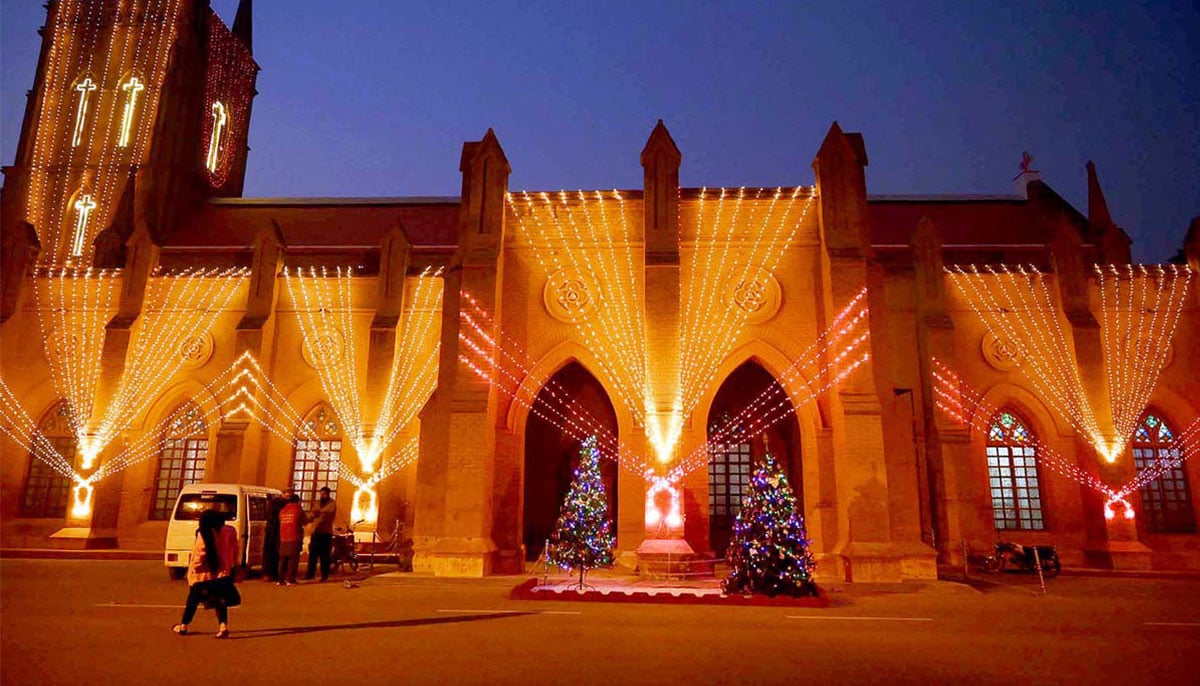 St. Johns Cathedral Church dazzles with colorful lights, celebrating the festive spirit of Christmas Eve  in Peshawar on December 20, 2024. — APP