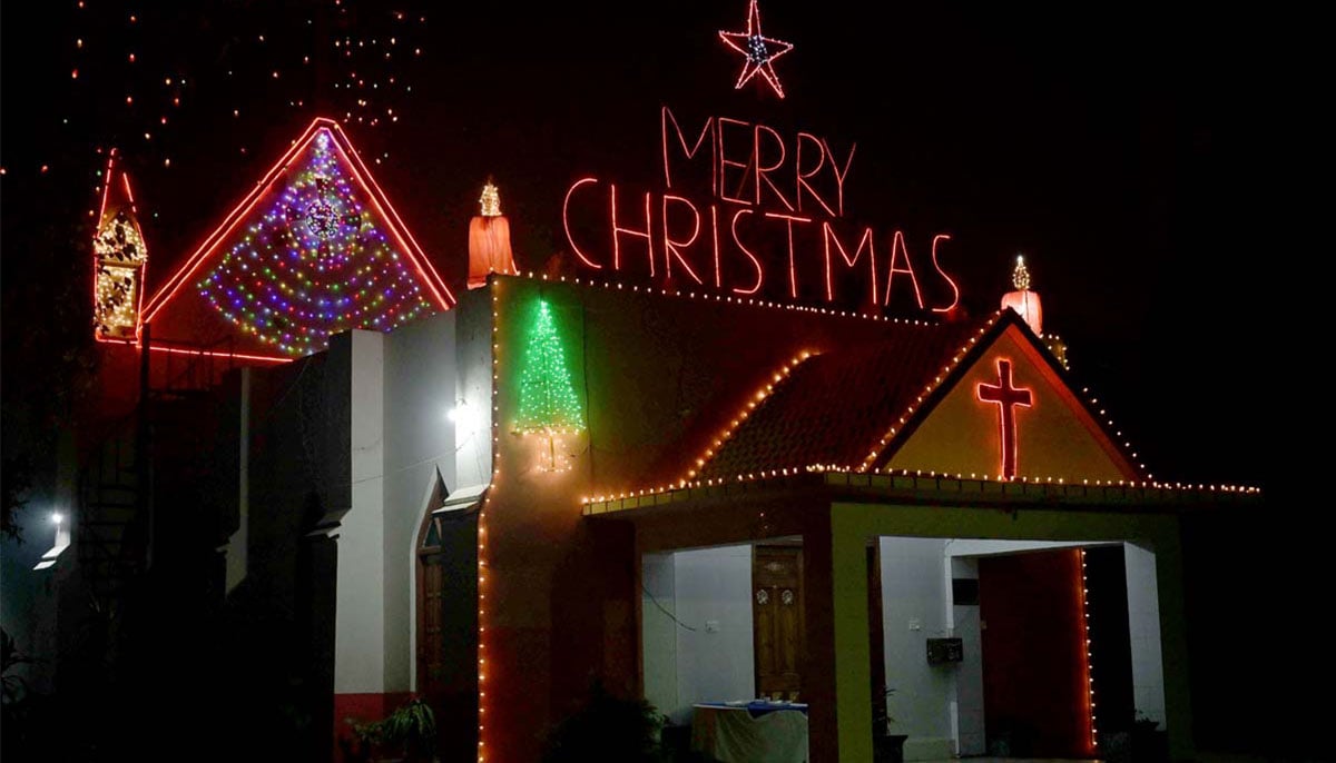 A beautifully lit church on College Road shines bright ahead of the upcoming Christmas celebrations in Sargodha on December 22, 2024. — APP