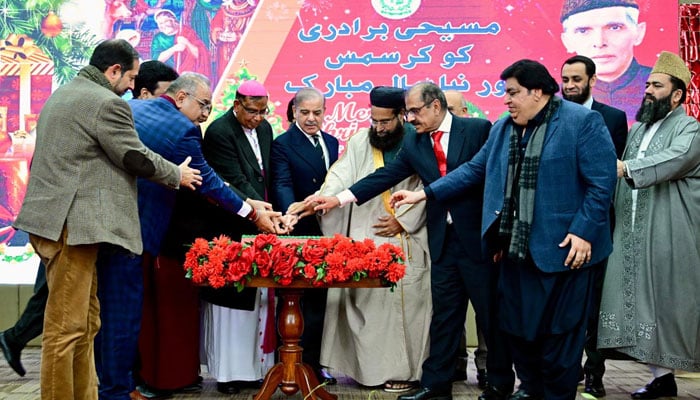 Prime Minister Shehbaz Sharif cuts a cake to celebrate Christmas 2024 in Islamabad on December 25, 2024. — PID