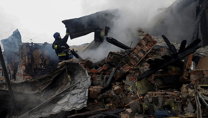 Firefighters work at the site of residential buildings hit by a Russian drone strike, amid Russias attack on Ukraine, in Kharkiv, Ukraine December 25, 2024. — Reuters