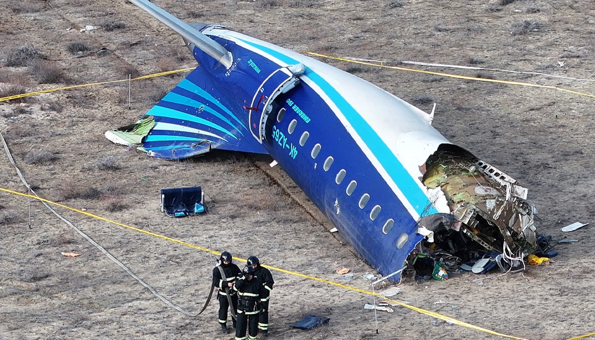 Specialists works at the crash site of an Azerbaijan Airlines Embraer passenger plane near the city of Aktau, Kazakhstan, December 26, 2024. — Reuters