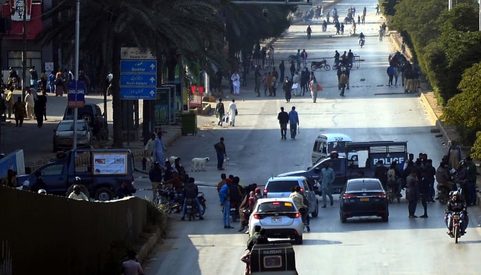 Activists of MWM have blocked a road at Colony Gate located on Sharea Faisal in Karachi on December 27, 2024. — PPI