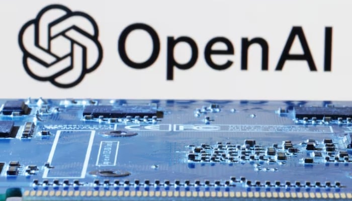 OpenAI logo is seen near computer motherboard in this illustration taken on January 8, 2024. —Reuters