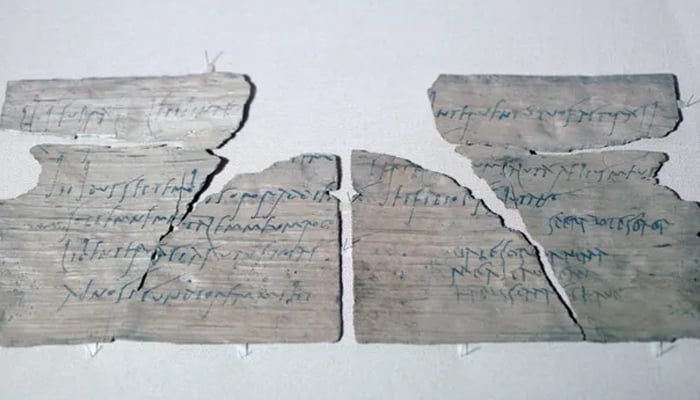 A birthday invitation penned on a thin wood tablet found at the Roman fort of Vindolanda in the UK. — The Print Collector/File