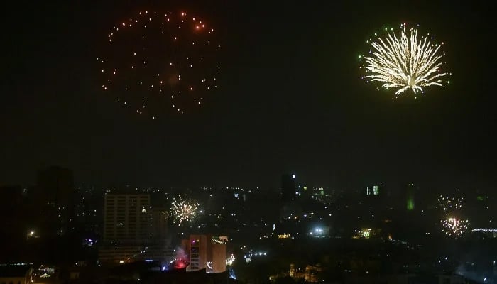 Fireworks explode over Karachi in this undated photo. — AFP/File