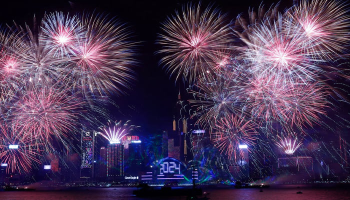 Fireworks explode over Victoria Harbour to celebrate the New Year in Hong Kong on January 1, 2024. — Reuters