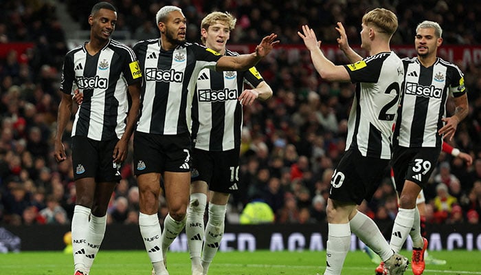 Newcastle Uniteds Alexander Isak celebrates scoring their first goal with Joelinton, Anthony Gordon and Lewis Hall in a Premier League match against Manchester United on December 30, 2024. — Reuters