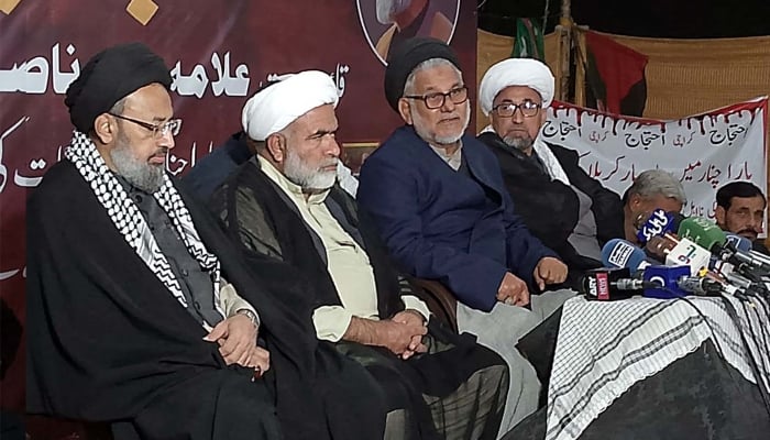 MWM leaders addressing media persons at a protest camp on Numaish Chowrangi in Karachi on December 30, 2024. — PPI