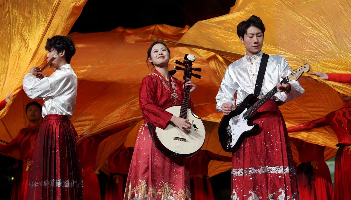 Performers take part in a countdown celebration event for New Years Eve, at Shougang Park in Beijing, China, December 31. — Reuters