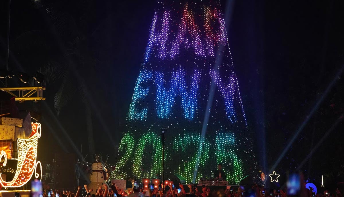 People attend New Year’s Eve celebrations in Mumbai, India, December 31. — Reuters