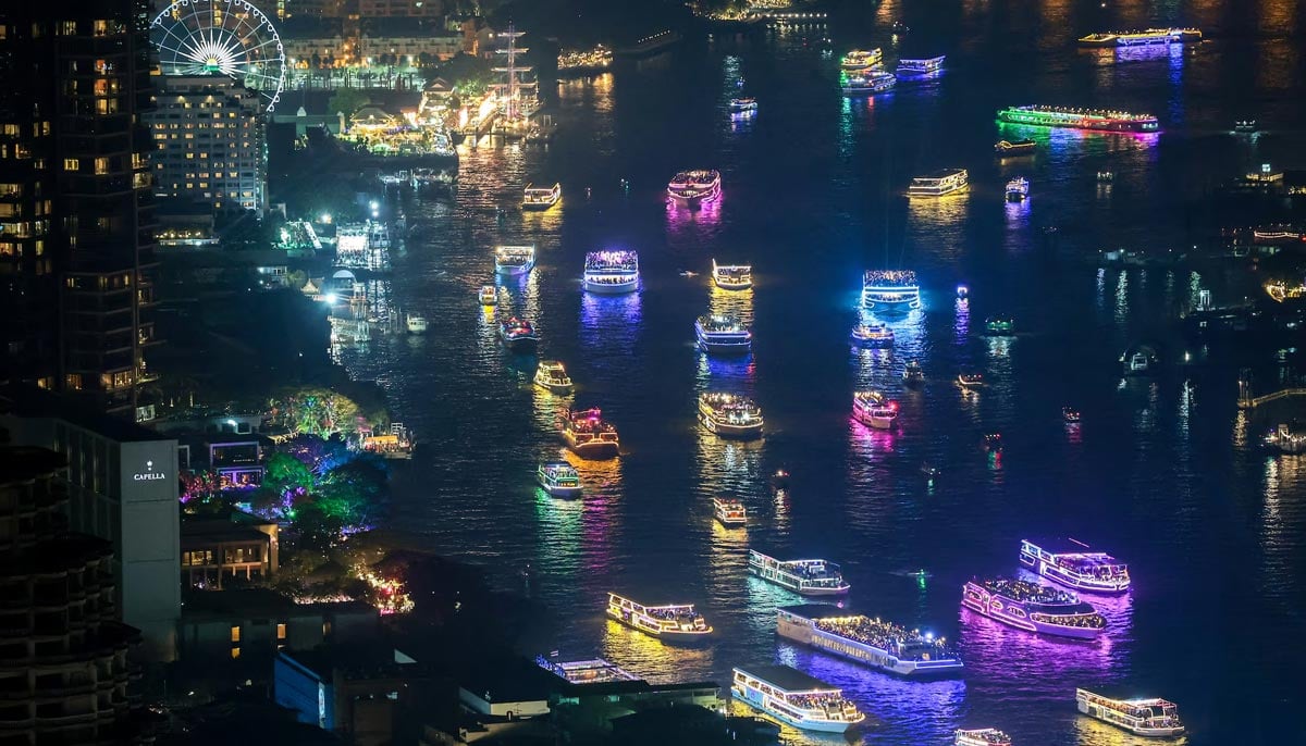 Tourist boats wait for New Year fireworks to start on the Chao Phraya river in Bangkok, Thailand, December 31. — Reuters