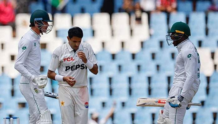 Pakistans Mohammad Abbas (C) reacts as South Africas Marco Jansen (L) and Kagiso Rabada (R) celebrate South Africa winning the match during the fourth day of the first Test match between South Africa and Pakistan at SuperSport Park in Centurion on December 29, 2024. — AFP