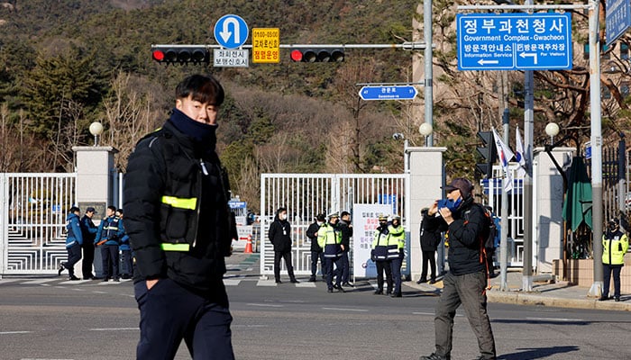 Police officers stand guard near the Government Complex Gwacheon in Gwacheon, South Korea, January 3, 2025. — Reuters